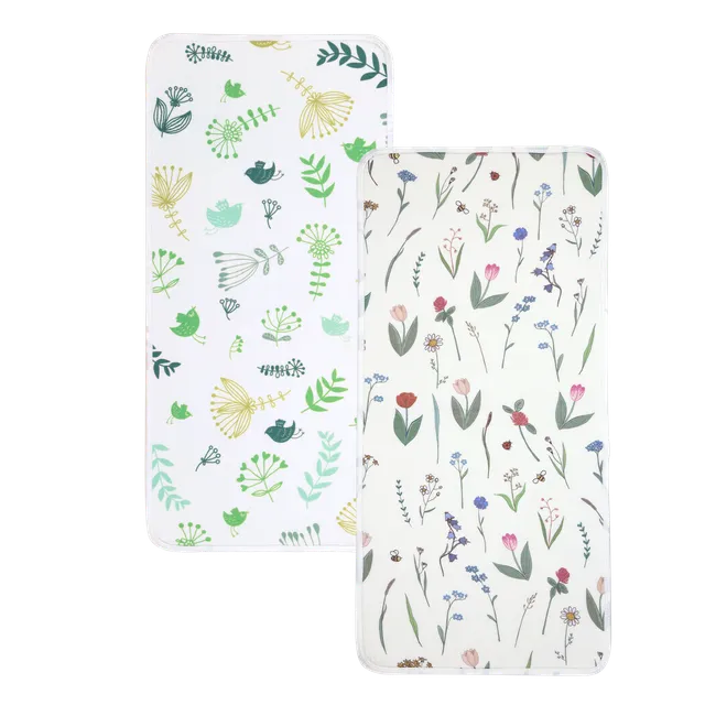 haakaa-wasserdichte-wickelunterlage-2er-set-4-designs image 1