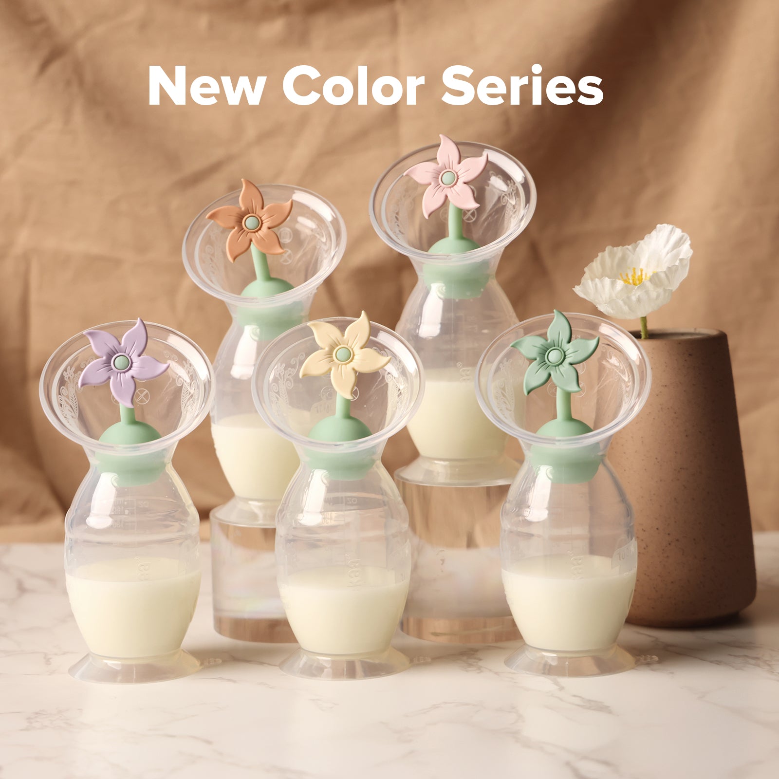 haakaa-generation-2-milchpumpe-mit-blumen-stopper-geschenkset-150-ml-100-silikon image 6